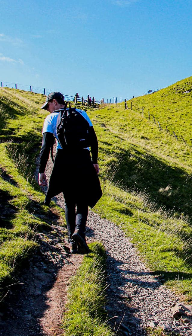 Me, walking up Mam Tor, walking away from the camera